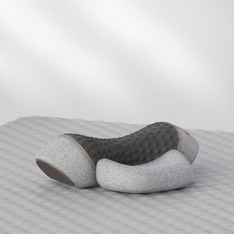 Gray and brown pillow on a striped surface