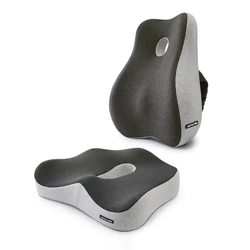 Two gray ergonomic seat cushions on a white background