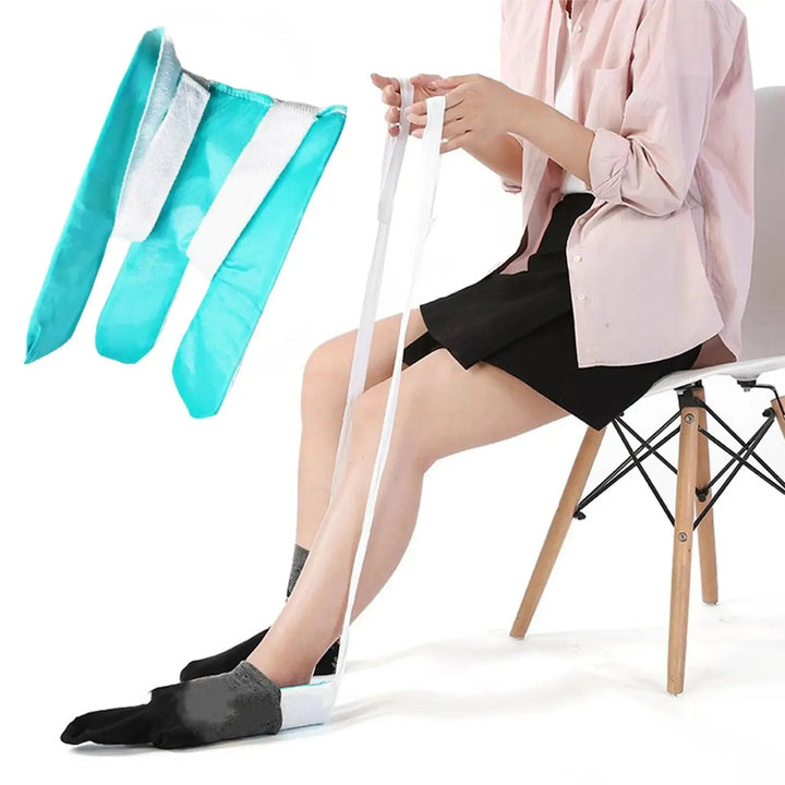 Person sitting on a chair using a white resistance band with teal and white resistance bands displayed.