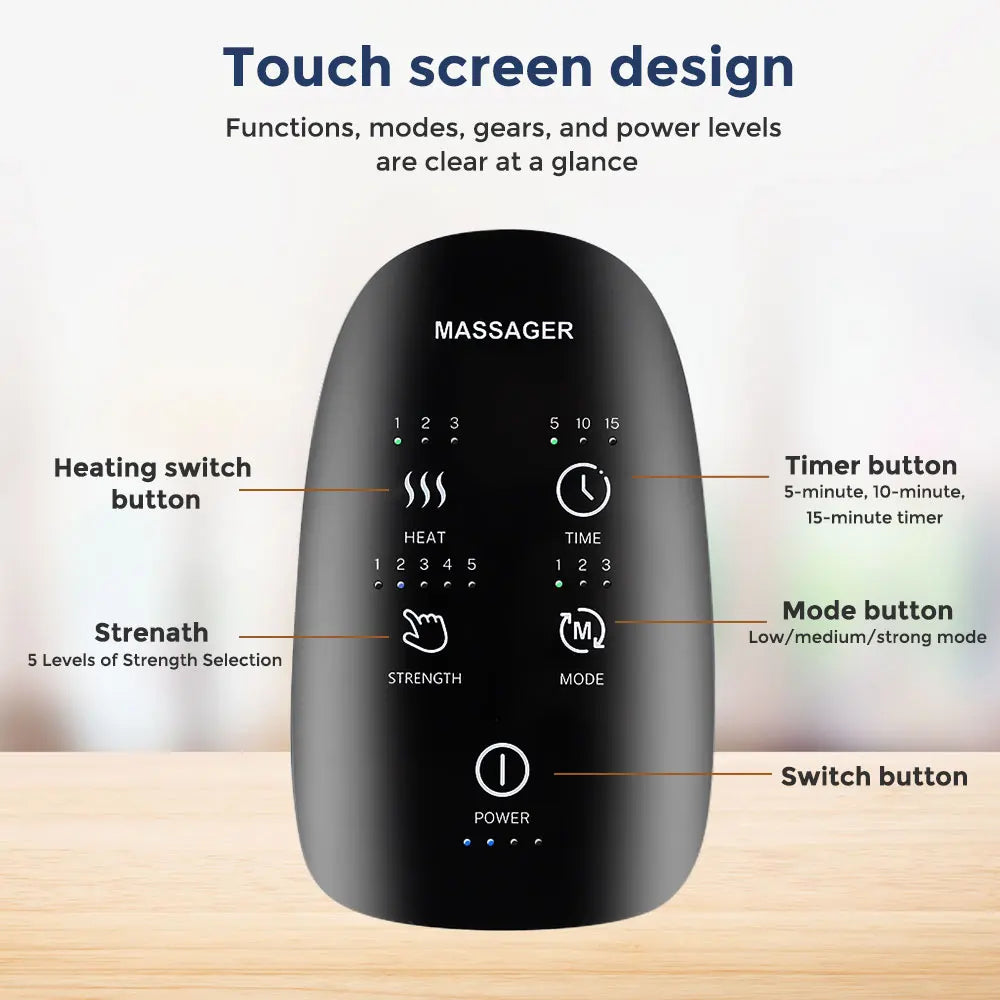 Black massager with labeled buttons on a wooden surface