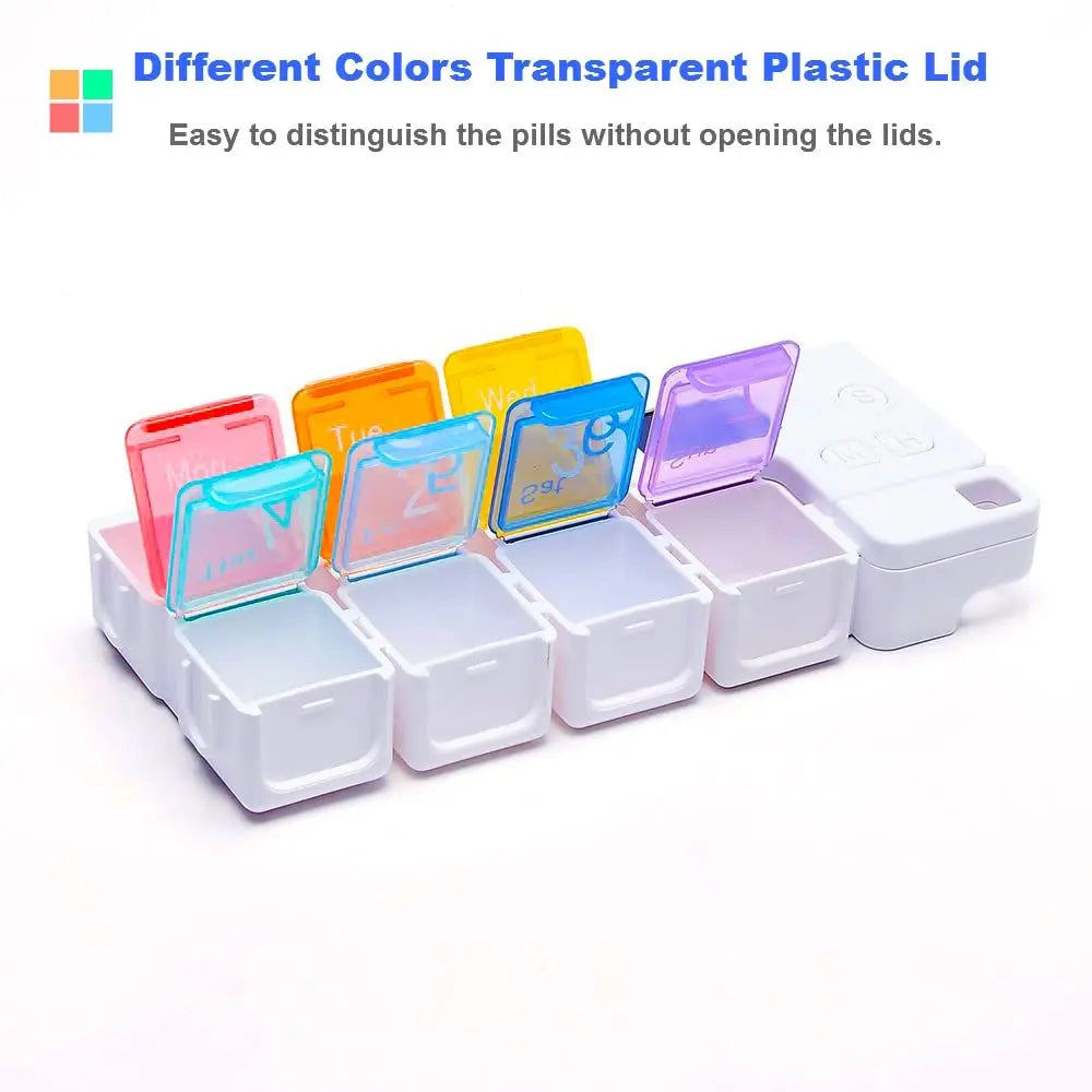Transparent plastic pill containers with colorful lids on a white background