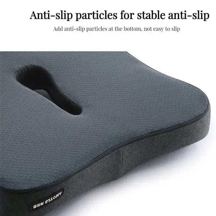 Gray cushion with anti-slip particles on a white background