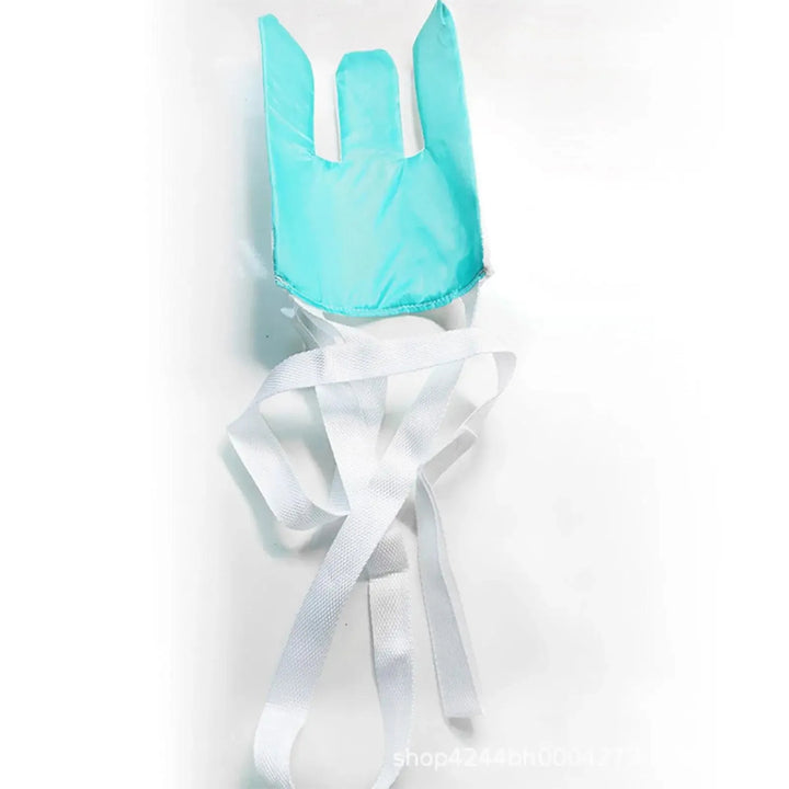 Turquoise bunny ears with white ribbons on a light gray background