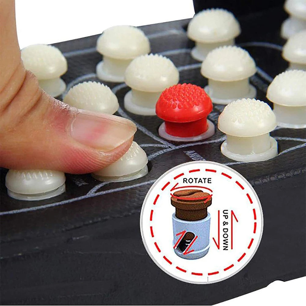 Hand interacting with a board game piece and a red and white piece on a black board.