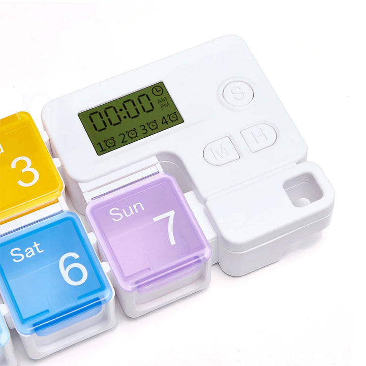 Multicolored pill organizer with digital display on a white background