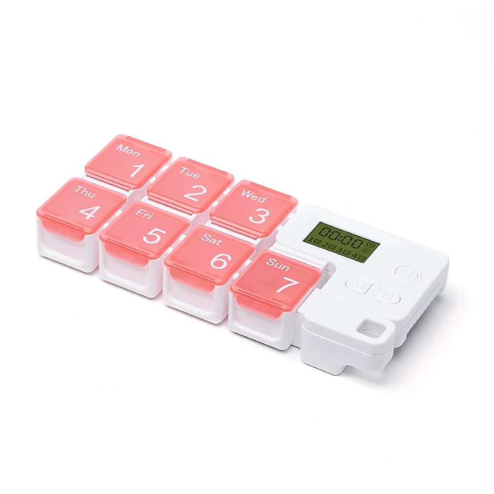 Weekly pill organizer with digital display on a white background
